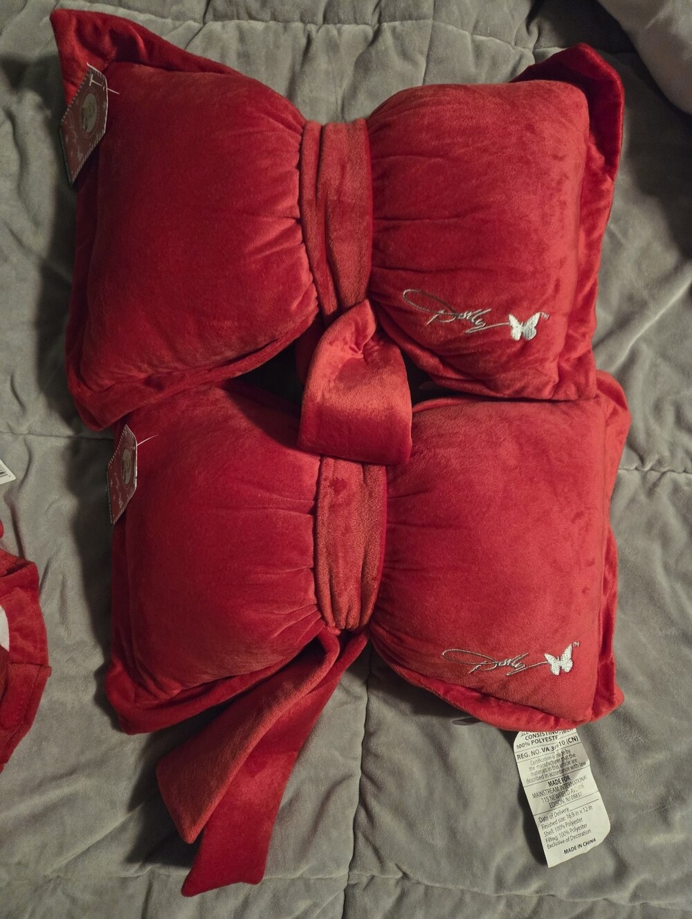 2 NWT RED DOLLY PARTON CHRISTMAS RED BOW PILLOWS. 16.9X 12